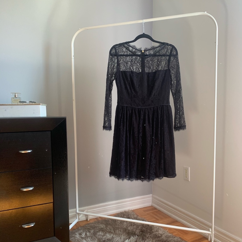 Black lace long-sleeve dress.